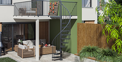 Outdoor spiral staircase in galvanized steel going to down stair patio
